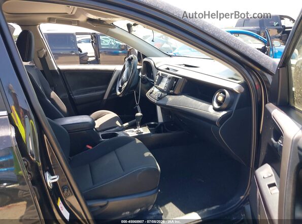 JTMRJREV2JD171971 2018 TOYOTA RAV4 HYBRID Black Widok wnętrza z przodu