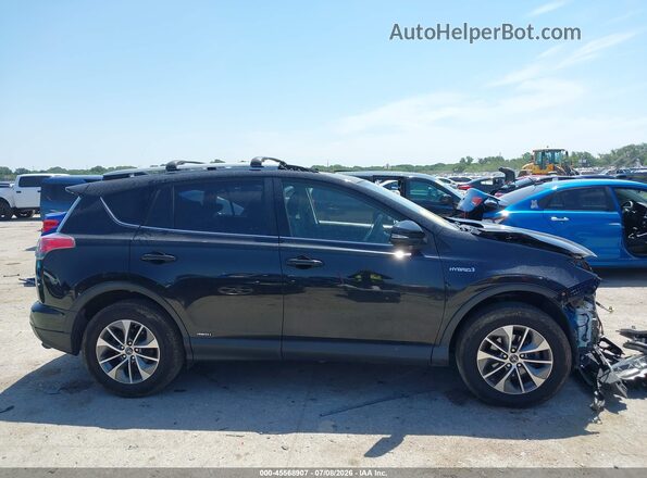 JTMRJREV2JD171971 2018 TOYOTA RAV4 HYBRID Black Widok wnętrza z tyłu