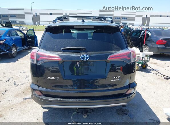 JTMRJREV2JD171971 2018 TOYOTA RAV4 HYBRID Black 
