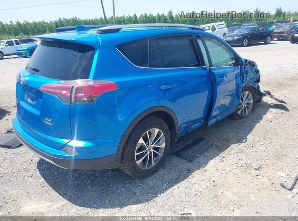 JTMRJREV2JD182081 2018 TOYOTA RAV4 HYBRID Blue Trasero derecho