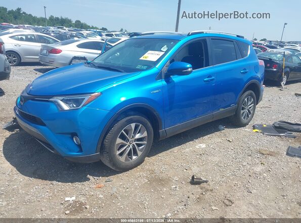 JTMRJREV2JD182081 2018 TOYOTA RAV4 HYBRID Blue Vista tres cuartos delantera izquierda