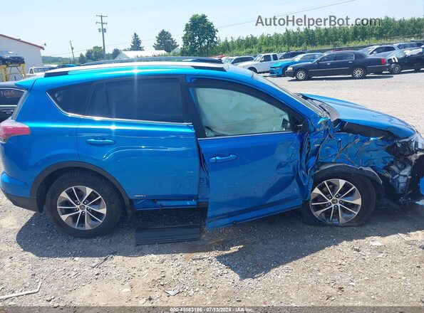 JTMRJREV2JD182081 2018 TOYOTA RAV4 HYBRID Blue Vista interior trasera