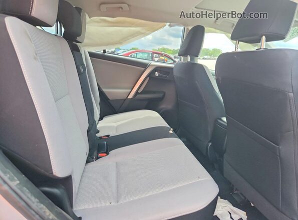 JTMRJREV2JD193596 2018 TOYOTA RAV4 Silver Rear interior view