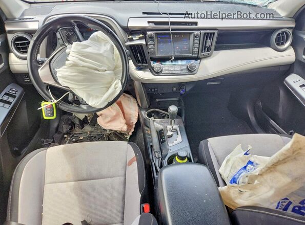 JTMRJREV2JD193596 2018 TOYOTA RAV4 Silver Dashboard view