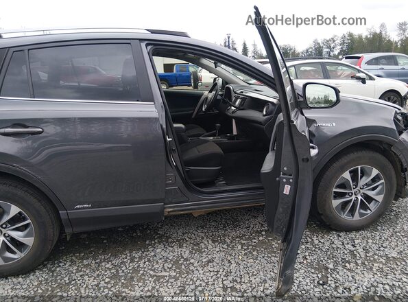 JTMRJREV2JD213989 2018 TOYOTA RAV4 HYBRID Серый Вид салона спереди