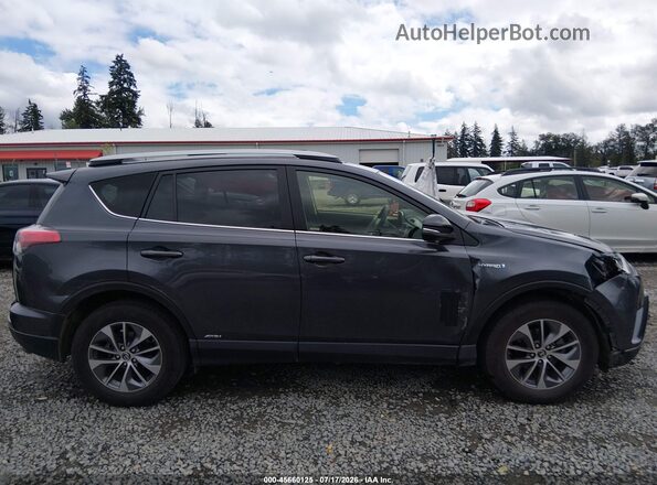JTMRJREV2JD213989 2018 TOYOTA RAV4 HYBRID Серый Вид задней части салона