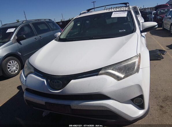 JTMRJREV2JD242277 2018 TOYOTA RAV4 HYBRID White Widok deski rozdzielczej