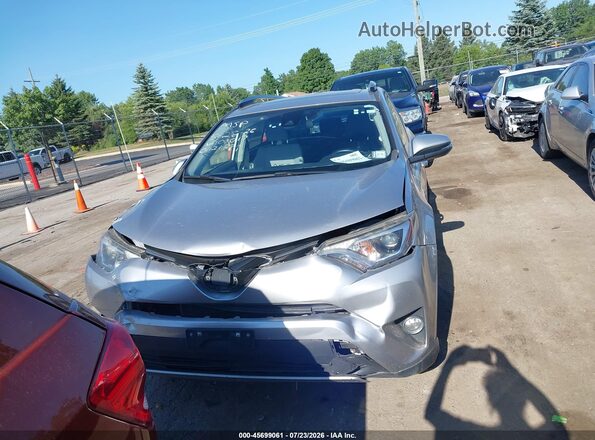JTMRJREV3HD101017 2017 TOYOTA RAV4 HYBRID Silver Սարքավորումների վահանակի տեսք