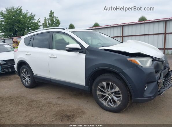 JTMRJREV4GD015441 2016 TOYOTA RAV4 HYBRID White Rear interior view