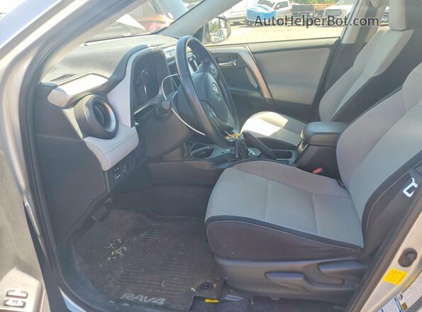 JTMRJREV6GD043824 2016 TOYOTA RAV4 Silver წინა სალონის ხედი