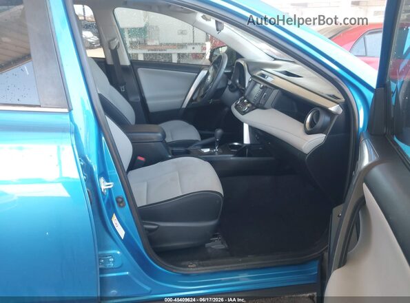 JTMRJREV6HD076338 2017 TOYOTA RAV4 HYBRID Blue Front interior view