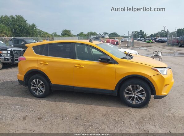 JTMRJREV6JD251287 2018 TOYOTA RAV4 HYBRID Yellow უკანა სალონის ხედი