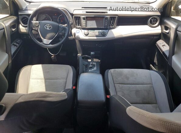 JTMRJREV7GD009603 2016 TOYOTA RAV4 Silver Widok deski rozdzielczej