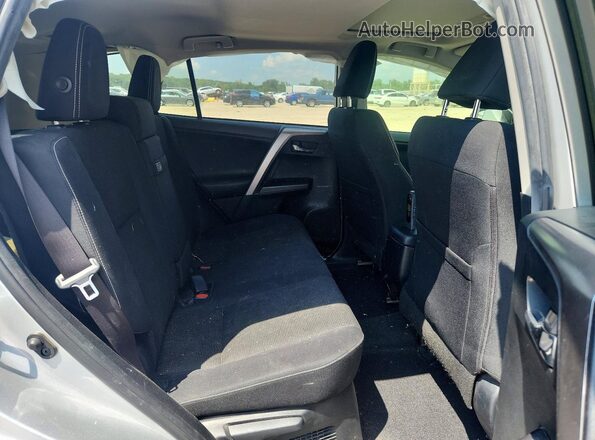 JTMRJREV7GD016812 2016 TOYOTA RAV4 Silver Rear seats view