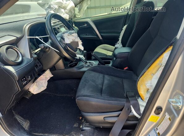 JTMRJREV7GD016812 2016 TOYOTA RAV4 Silver Front interior view