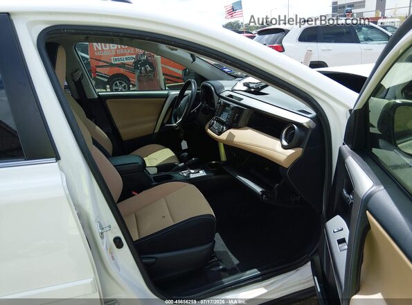 JTMRJREV7GD022190 2016 TOYOTA RAV4 HYBRID White Front interior view