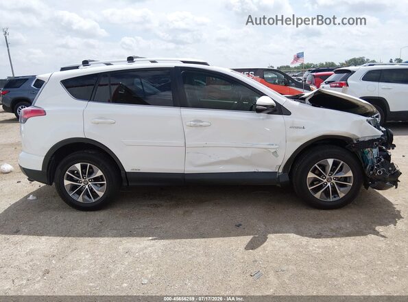JTMRJREV7GD022190 2016 TOYOTA RAV4 HYBRID White Rear interior view