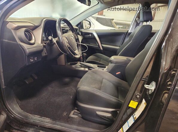 JTMRJREV7GD056971 2016 TOYOTA RAV4 Black წინა სალონის ხედი