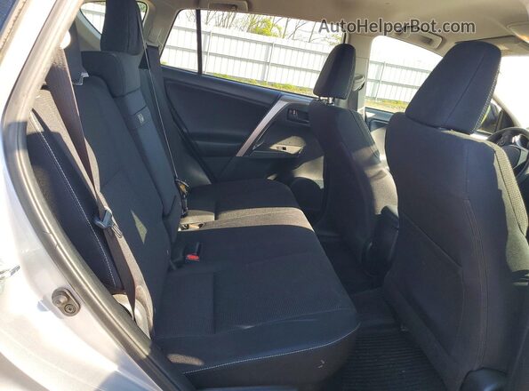 JTMRJREV7JD196753 2018 TOYOTA RAV4 Silver Вид задньої частини салону