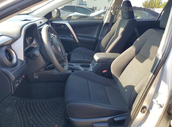 JTMRJREV7JD196753 2018 TOYOTA RAV4 Silver Вид салону спереду