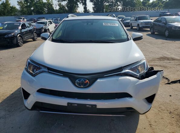 JTMRJREV8JD238766 2018 TOYOTA RAV4 White Front view