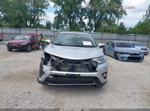 JTMRJREV9GD042845 2016 TOYOTA RAV4 HYBRID Silver Սալոնի հետևի տեսք