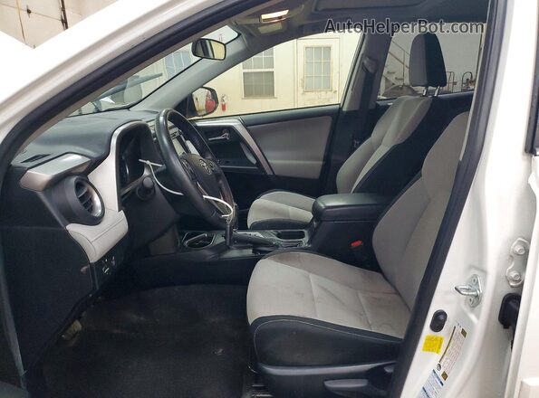 JTMRJREV9GD058768 2016 TOYOTA RAV4 Белый Вид салона спереди