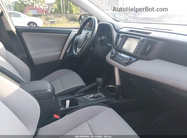 JTMRJREV9JD236038 2018 TOYOTA RAV4 HYBRID Blue Front interior view