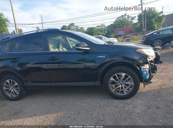 JTMRJREV9JD236038 2018 TOYOTA RAV4 HYBRID Blue Rear interior view