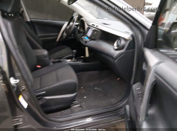 JTMRJREV9JD237030 2018 TOYOTA RAV4 HYBRID Gray Vista interior delantera