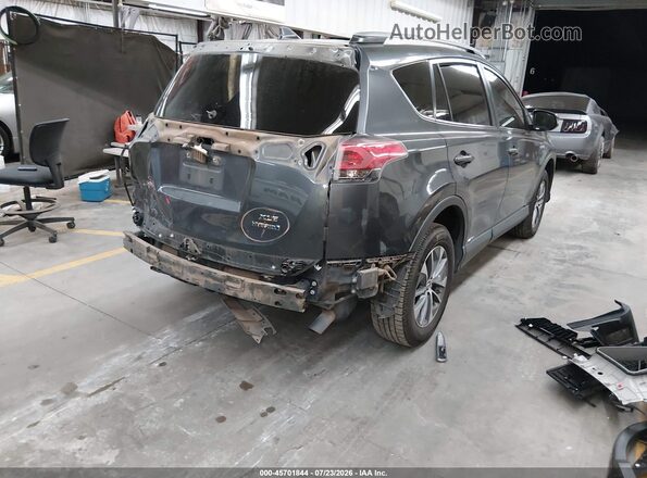 JTMRJREV9JD237030 2018 TOYOTA RAV4 HYBRID Gray Trasero derecho