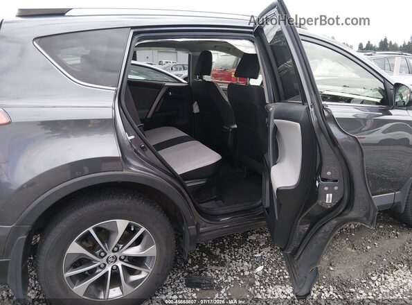 JTMRJREVXGD033717 2016 TOYOTA RAV4 HYBRID Серый Вид наклейки с VIN-кодом
