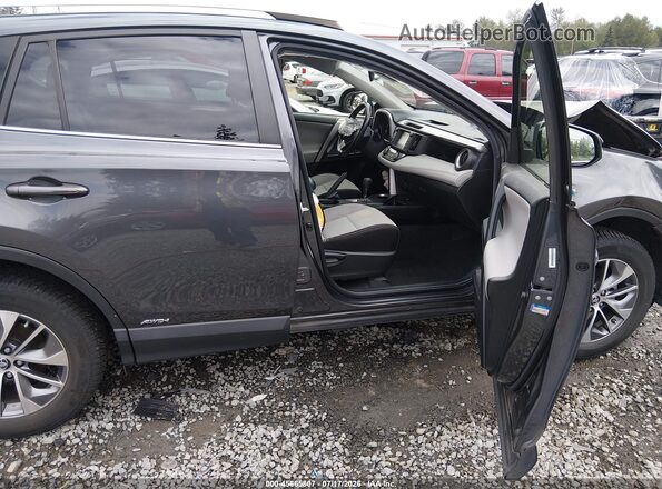 JTMRJREVXGD033717 2016 TOYOTA RAV4 HYBRID Серый Вид салона спереди