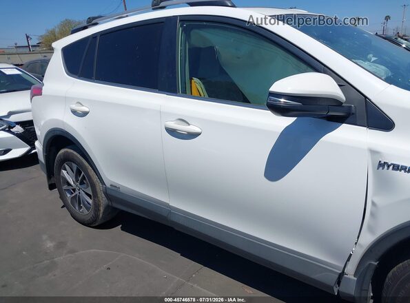 JTMRJREVXJD180207 2018 TOYOTA RAV4 HYBRID Белый Вид задней части салона