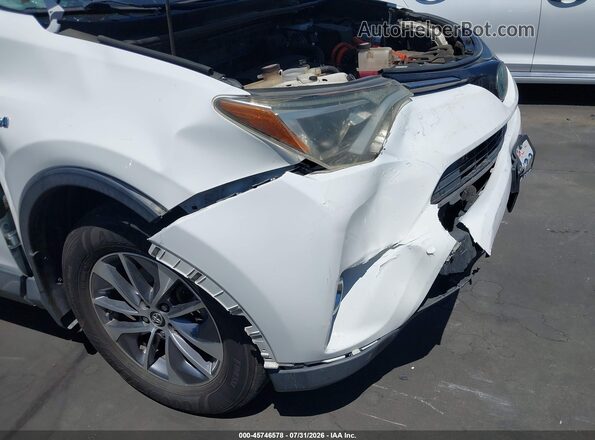JTMRJREVXJD180207 2018 TOYOTA RAV4 HYBRID Белый Вид спереди