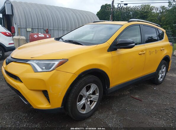 JTMRJREVXJD258775 2018 TOYOTA RAV4 HYBRID Yellow Vista tres cuartos delantera izquierda
