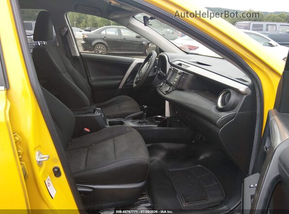 JTMRJREVXJD258775 2018 TOYOTA RAV4 HYBRID Yellow Vista interior delantera