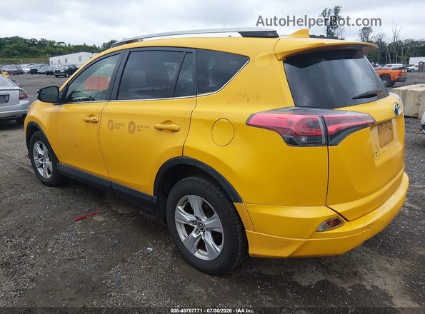 JTMRJREVXJD258775 2018 TOYOTA RAV4 HYBRID Yellow Trasero izquierdo