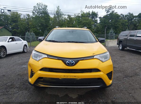 JTMRJREVXJD258775 2018 TOYOTA RAV4 HYBRID Yellow Vista del cuadro de instrumentos