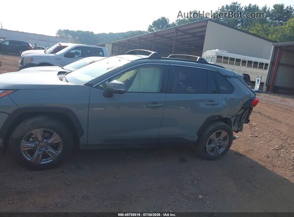 JTMRWRFV7ND157019 2022 TOYOTA RAV4 HYBRID Gray Vista interior trasera