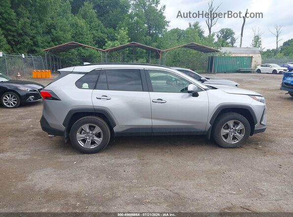 JTMRWRFVXPJ057694 2023 TOYOTA RAV4 HYBRID Silver Սալոնի հետևի տեսք