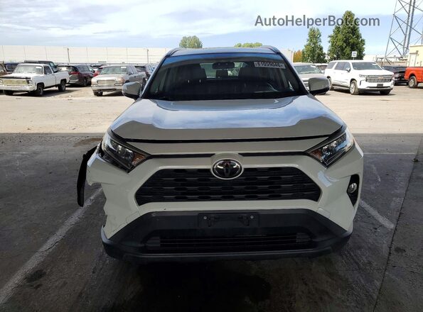 JTMW1RFV1KJ013903 2019 TOYOTA RAV4 White Front view
