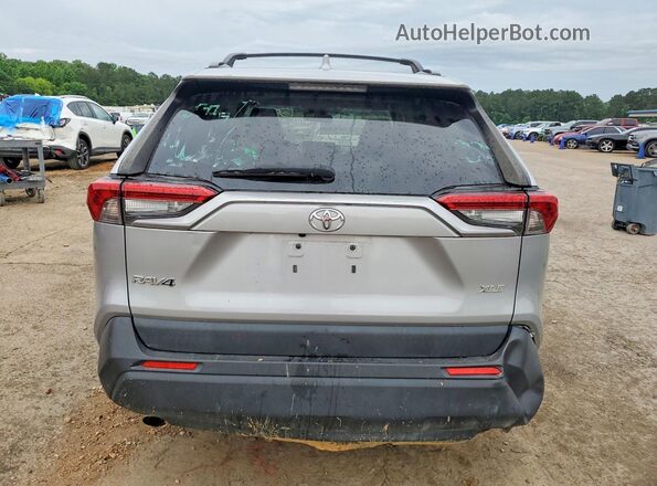 JTMW1RFV6KD020229 2019 TOYOTA RAV4 Silver Rear view