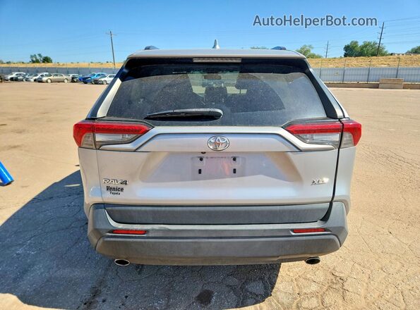 JTMW1RFV7KD509920 2019 TOYOTA RAV4 Silver Vista trasera