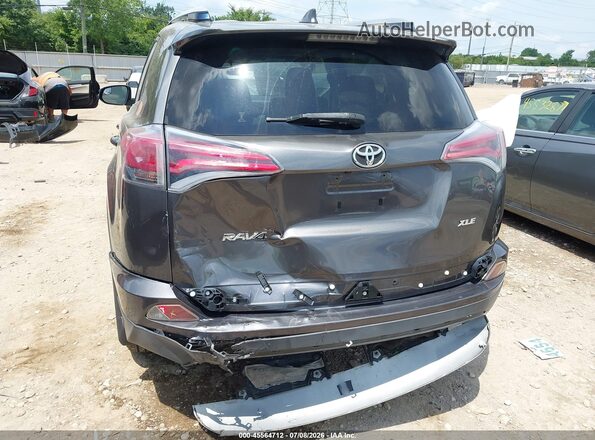 JTMWFREV0GJ062715 2016 TOYOTA RAV4 Gray წინა ხედი