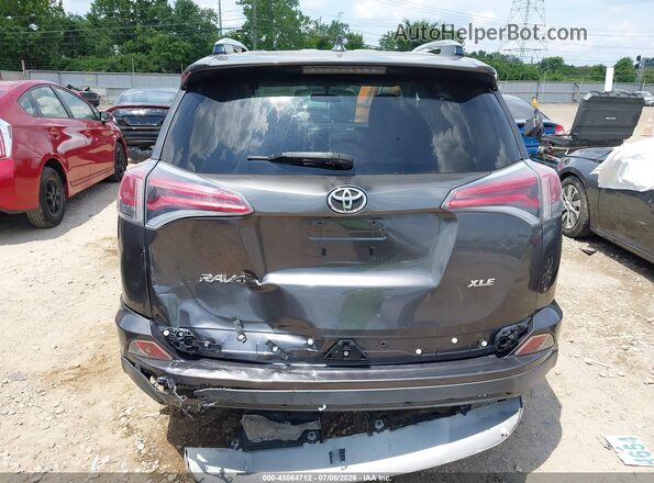 JTMWFREV0GJ062715 2016 TOYOTA RAV4 Gray 