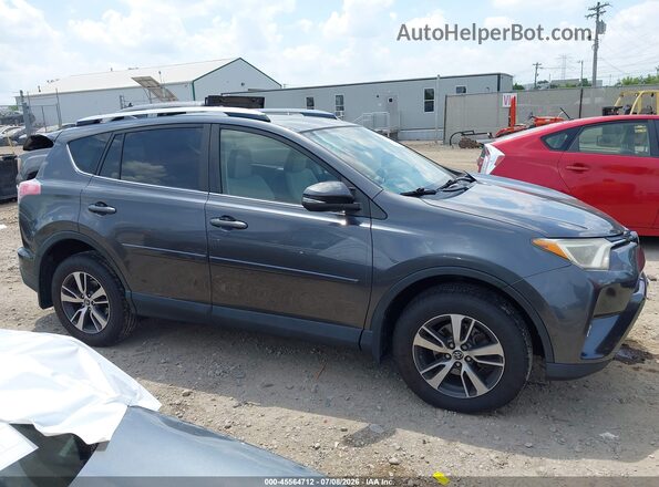 JTMWFREV0GJ062715 2016 TOYOTA RAV4 Gray უკანა სალონის ხედი