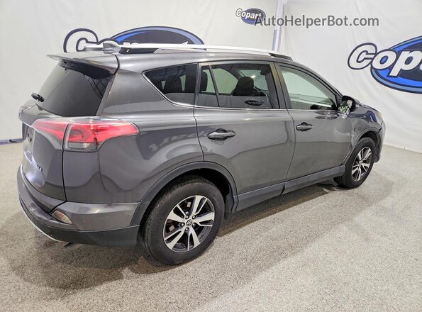 JTMWFREV0GJ086254 2016 TOYOTA RAV4 Gray Tył prawy