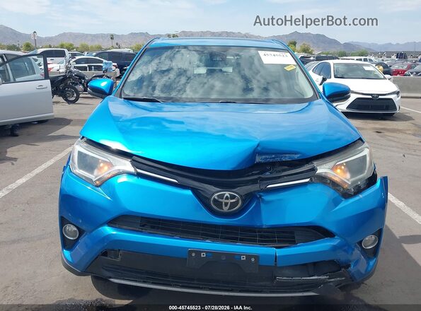 JTMWFREV0HD095052 2017 TOYOTA RAV4 Light Blue Widok z przodu