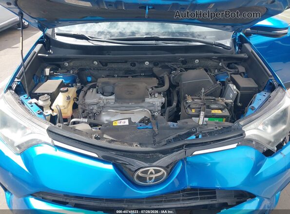 JTMWFREV0HD095052 2017 TOYOTA RAV4 Light Blue Widok z tyłu